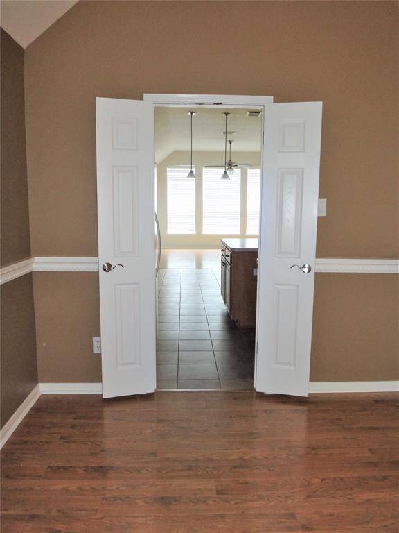 View from the formal dining room, looking towards the kitchen and family room.