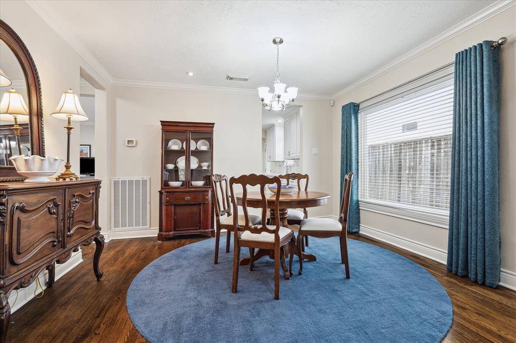 Dining area opening to the kitchen.