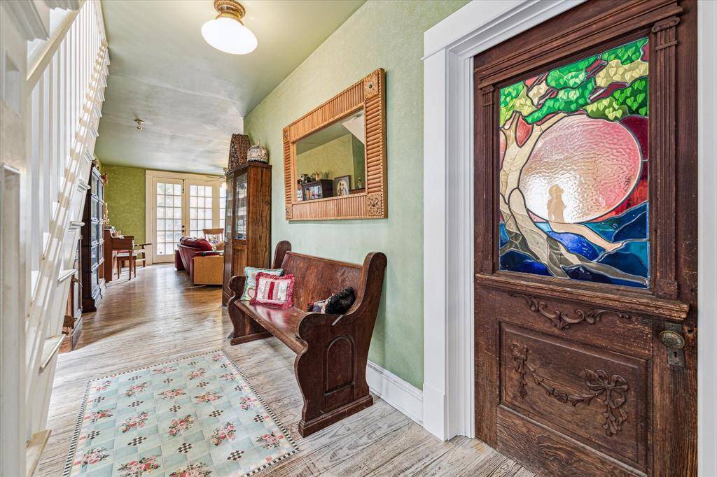 The first floor also has a bedroom with a full bath.