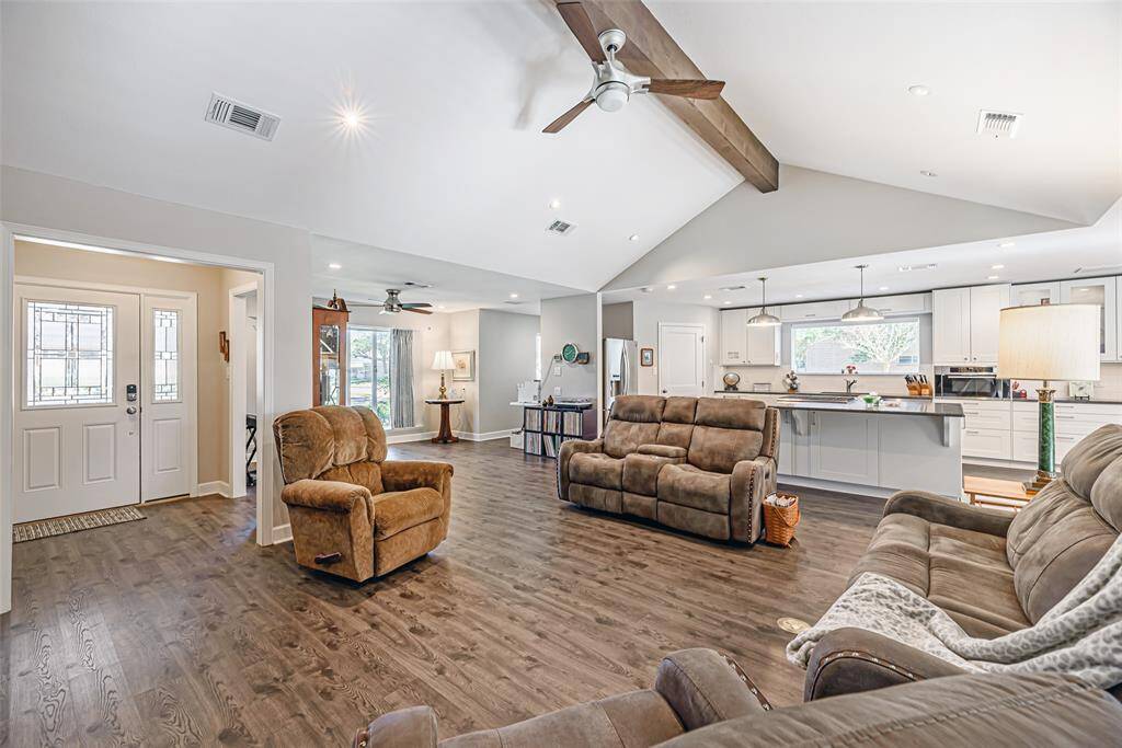 Alternate view of family room which is open to the kitchen and dining room.