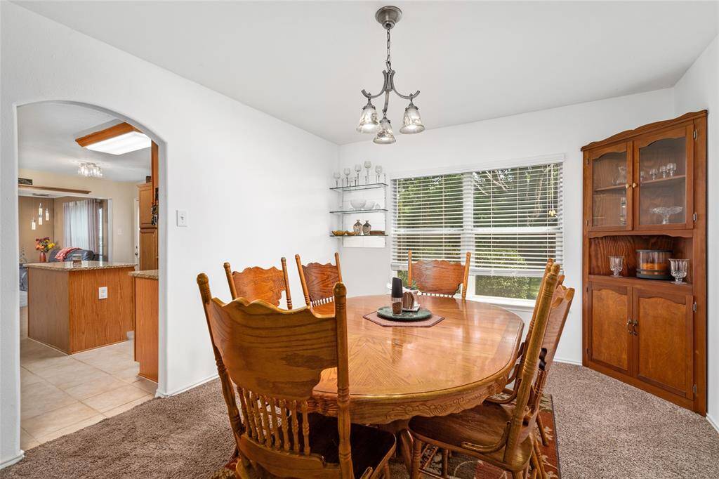 The double windows in your new dining area provides ample natural light and a fabulous view of the back yard.