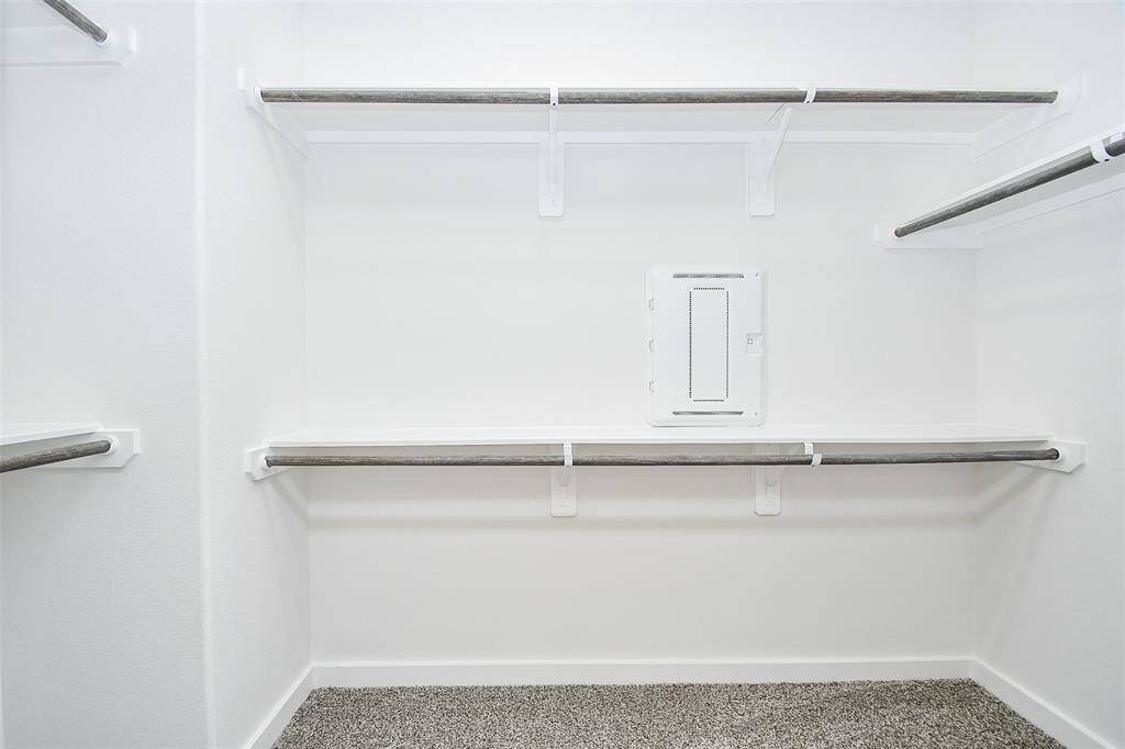 The spacious full-entry closet offers abundant storage solutions, keeping your wardrobe organized and easily accessible.