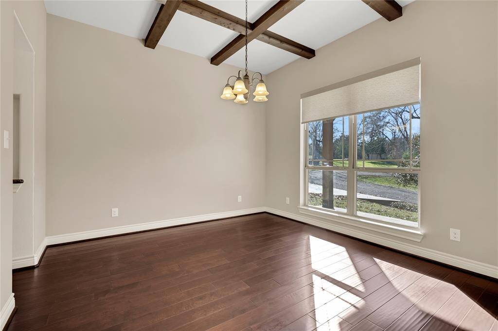 The breakfast area off the kitchen overlooks the back yard
