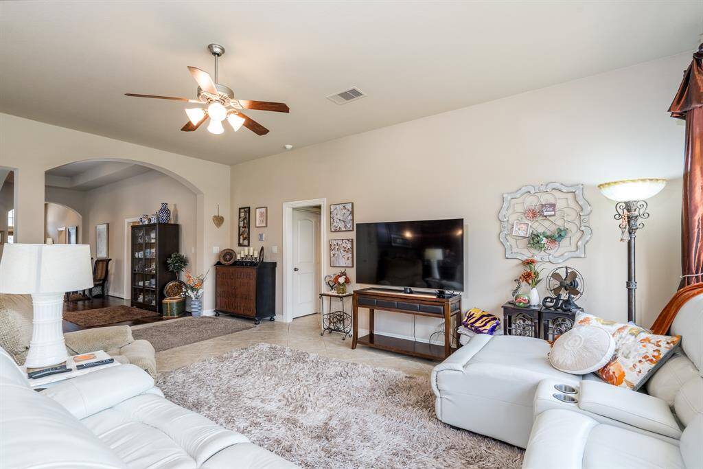 Off the living area is the primary suite.