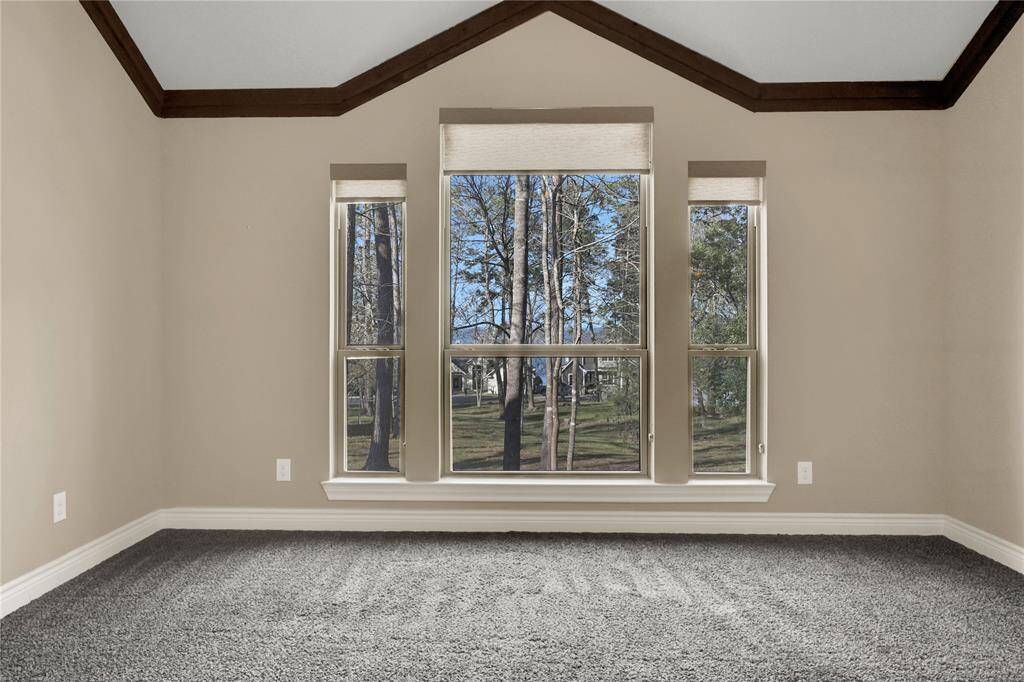 There are seasonal lake views from the primary bedroom