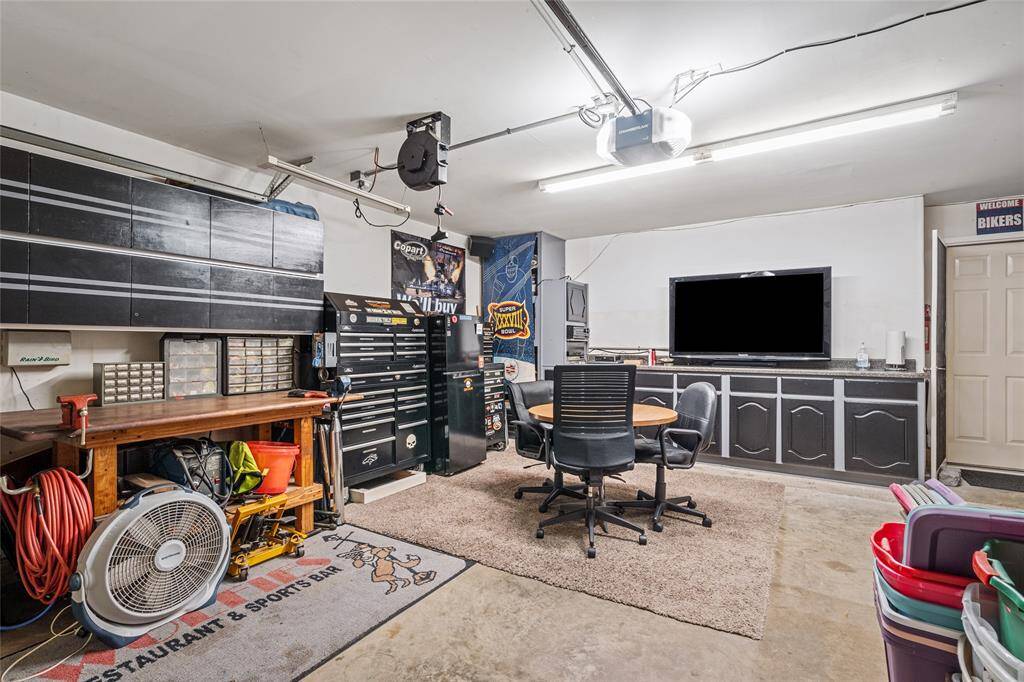 Your spacious garage is ideal for both cars and DIY projects.