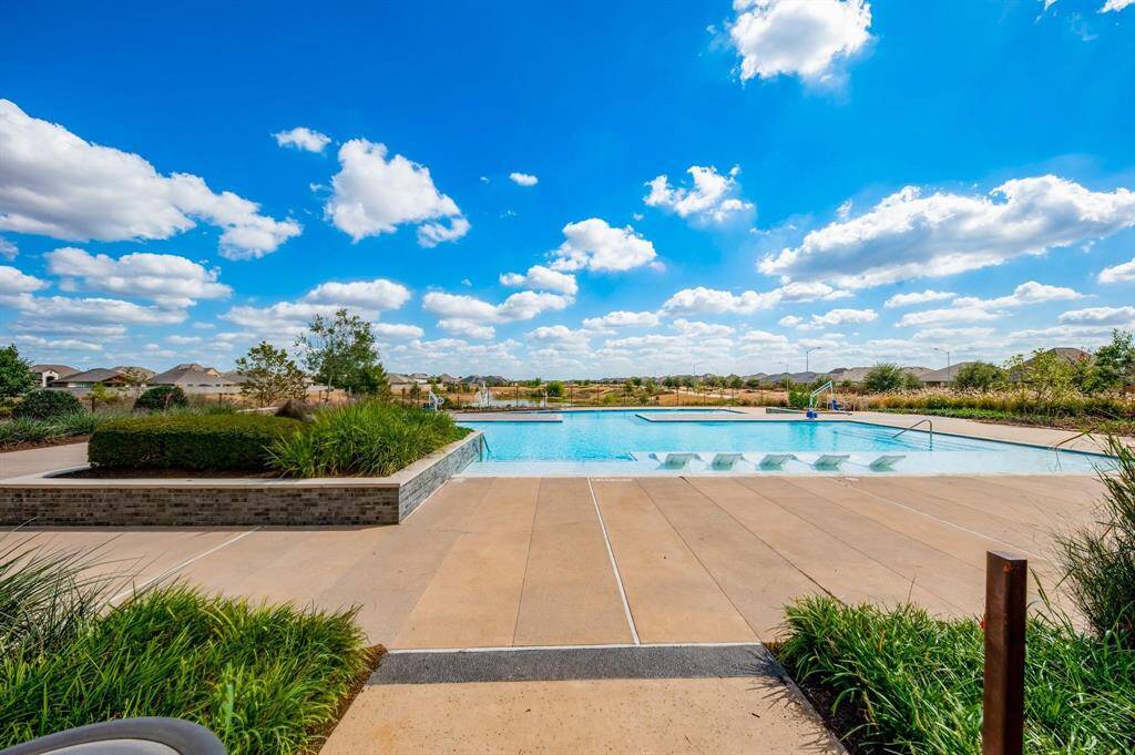 Take advantage of the community pool and expansive open spaces, perfect for enjoying the outdoors and spending quality time with loved ones and friends.
