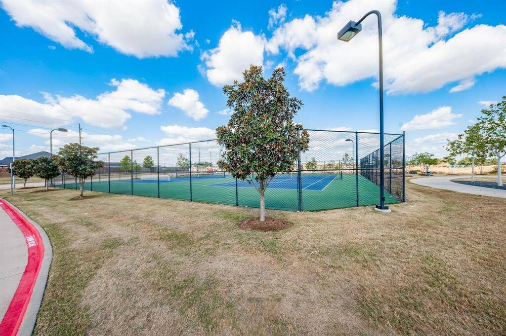 For those who love to stay active, this subdivision offers excellent amenities, including tennis courts for residents to enjoy.