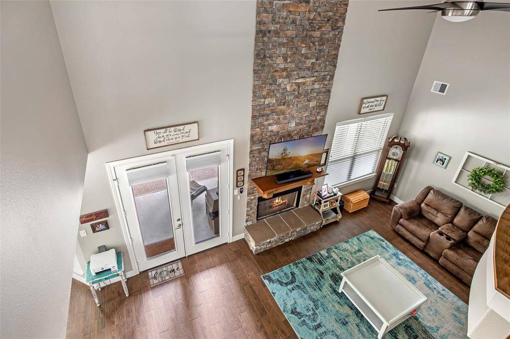 View of the living room from the second story balcony