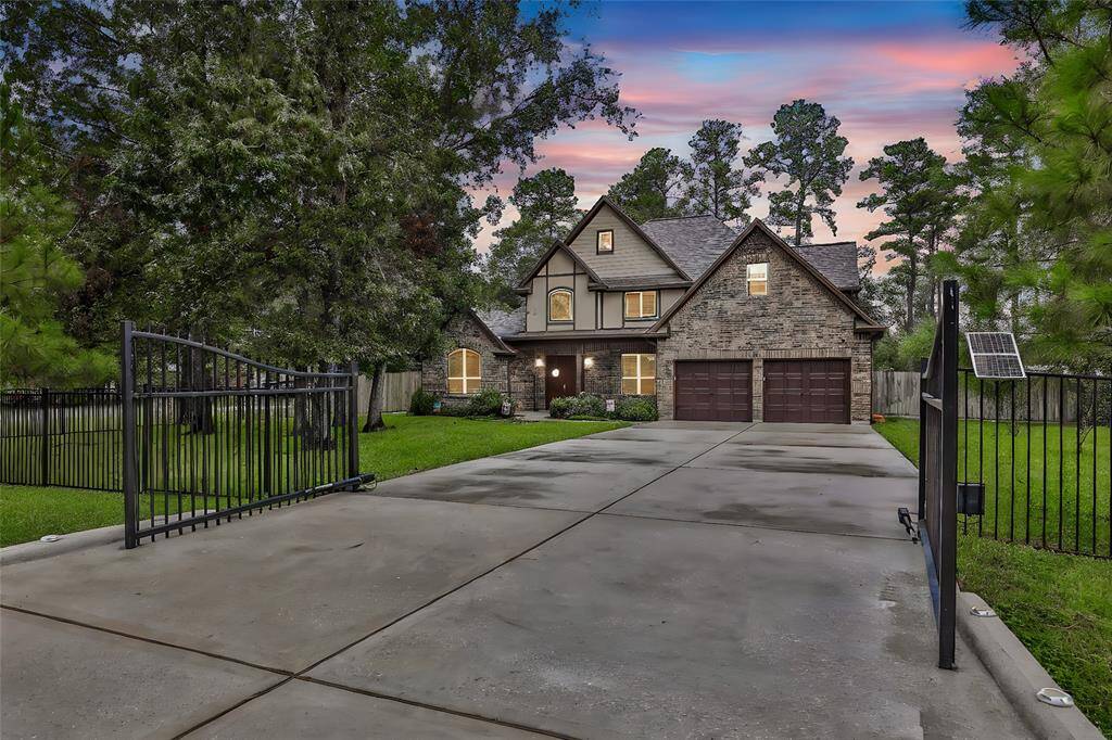 Automatic gates and fully fenced front yard.