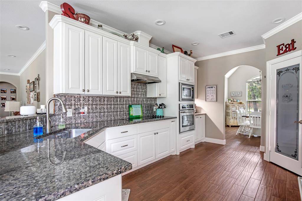 Kitchen sink over looks into the main living area