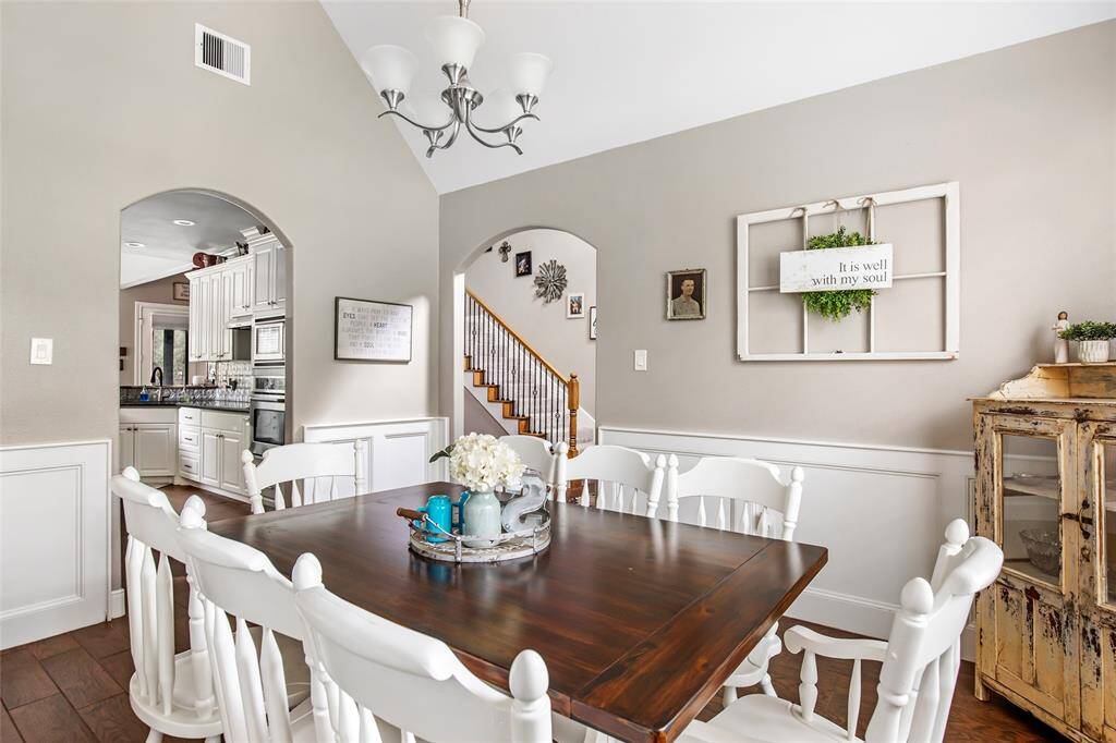 Dining room which connects to foyer and kitchen.