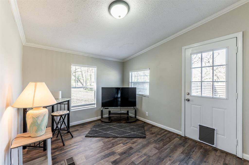 Bright third bedroom with direct access to a private deck.