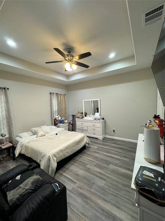 Big main bedroom offers setting area.