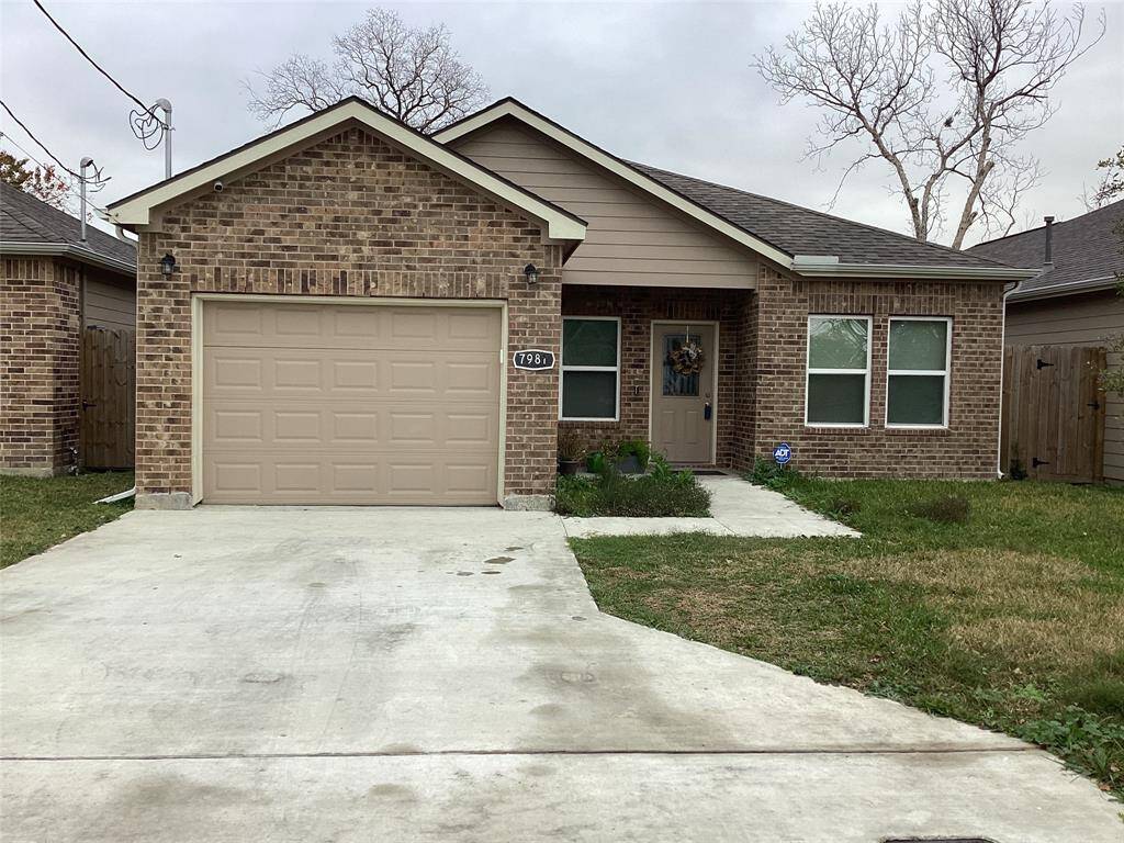 Nice curve appeal with extended driveway.