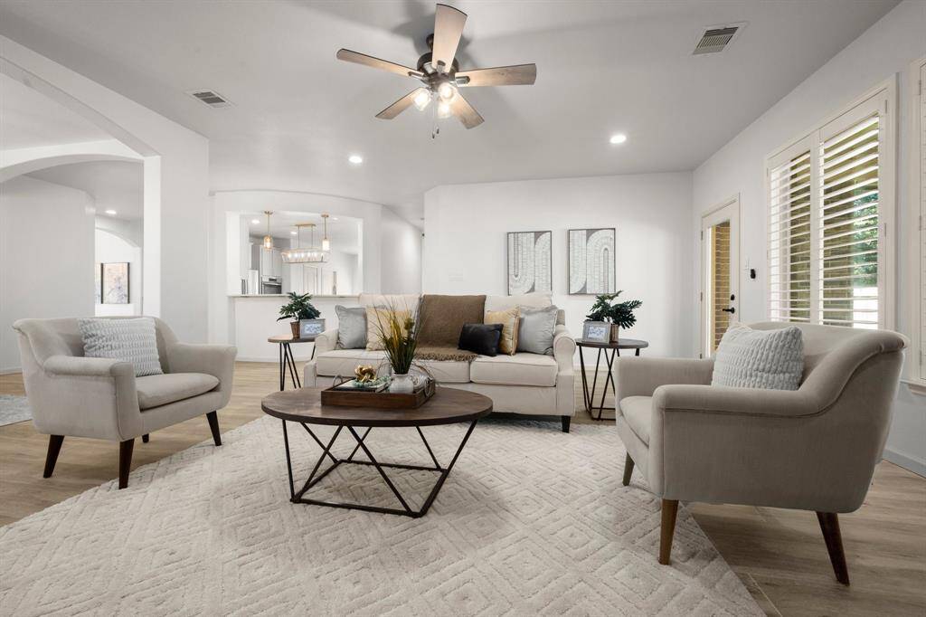 Open and airy living room offers a perfect balance of comfort and elegance.