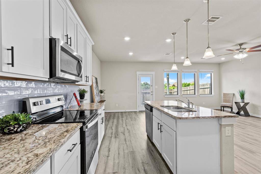 Another view of the open kitchen area.
