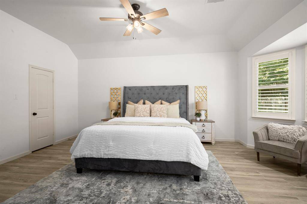 The room's spacious layout provides flexibility for a sitting area, making it the perfect retreat after a long day.