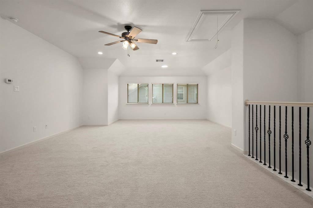 This expansive bonus room offers endless possibilities, whether used as a game room, media room, or additional living space.