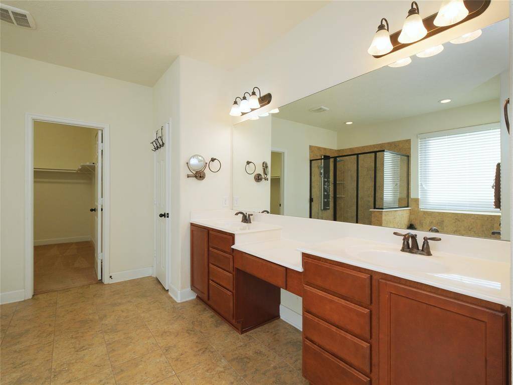 Check out this spacious and bright primary ensuite!