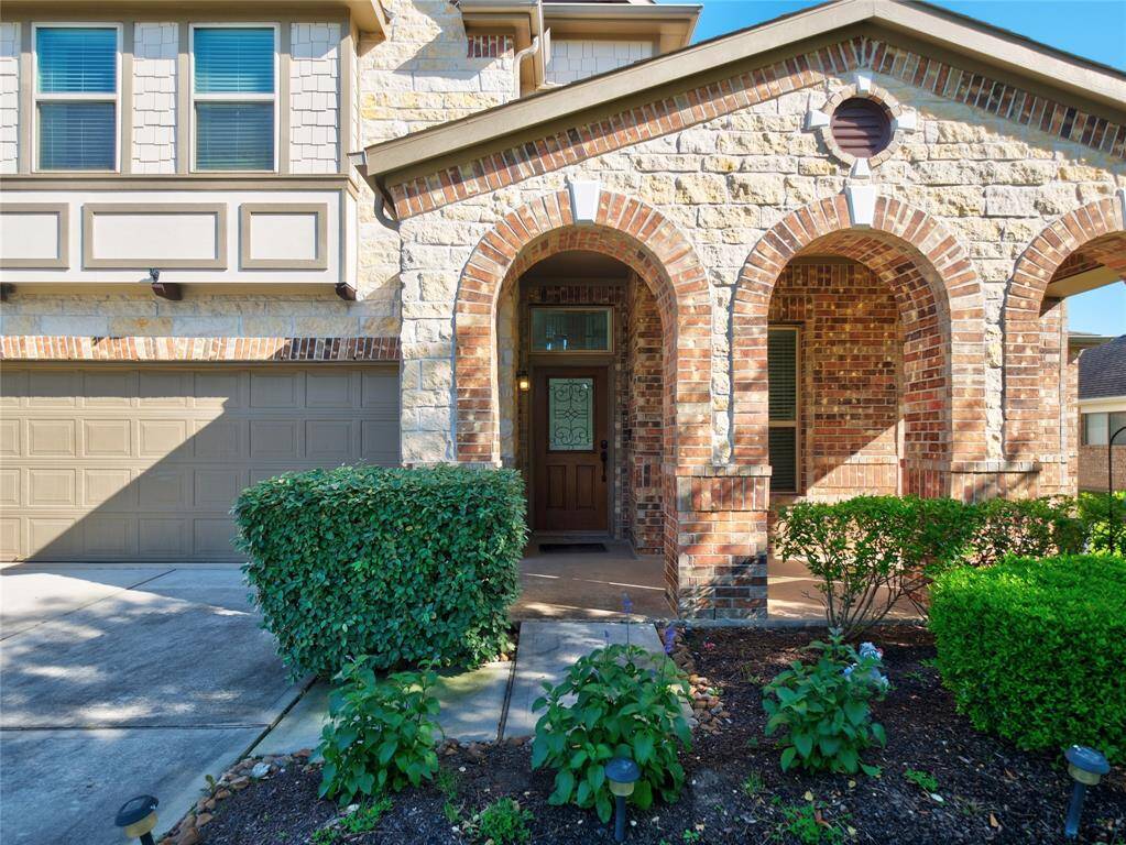 This beautiful 2 story home has a pretty front porch!