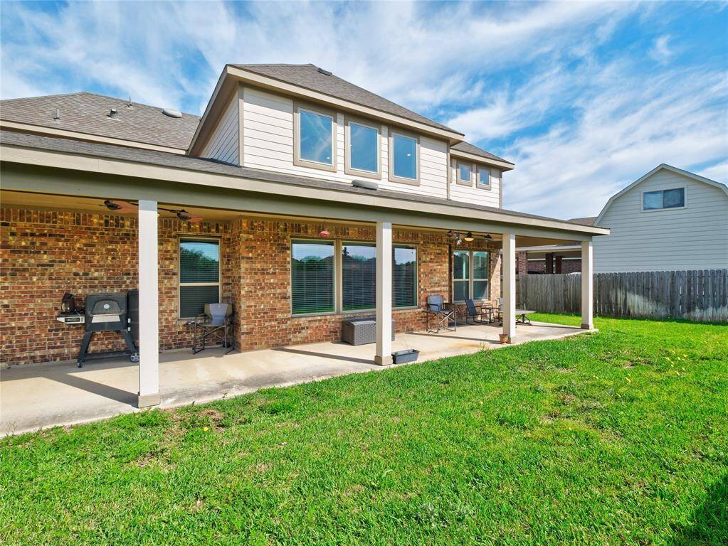 This back patio is so spacious! Enjoy the quiet!