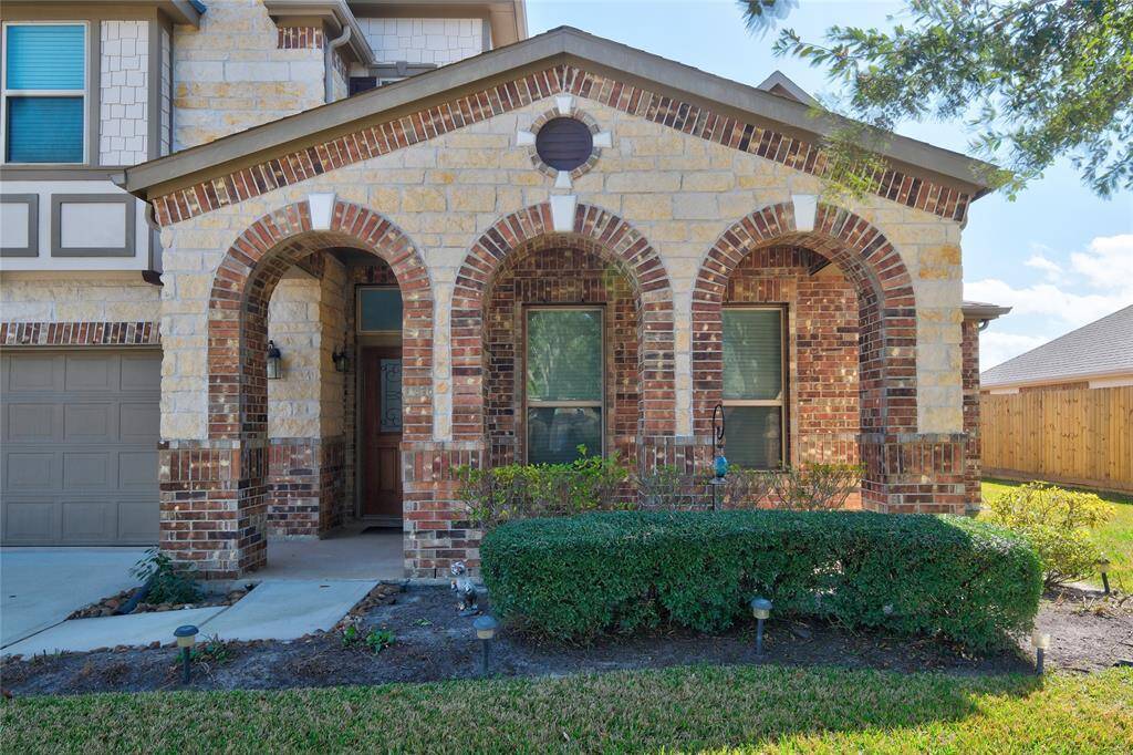 Check out the stone and brick front porch!
