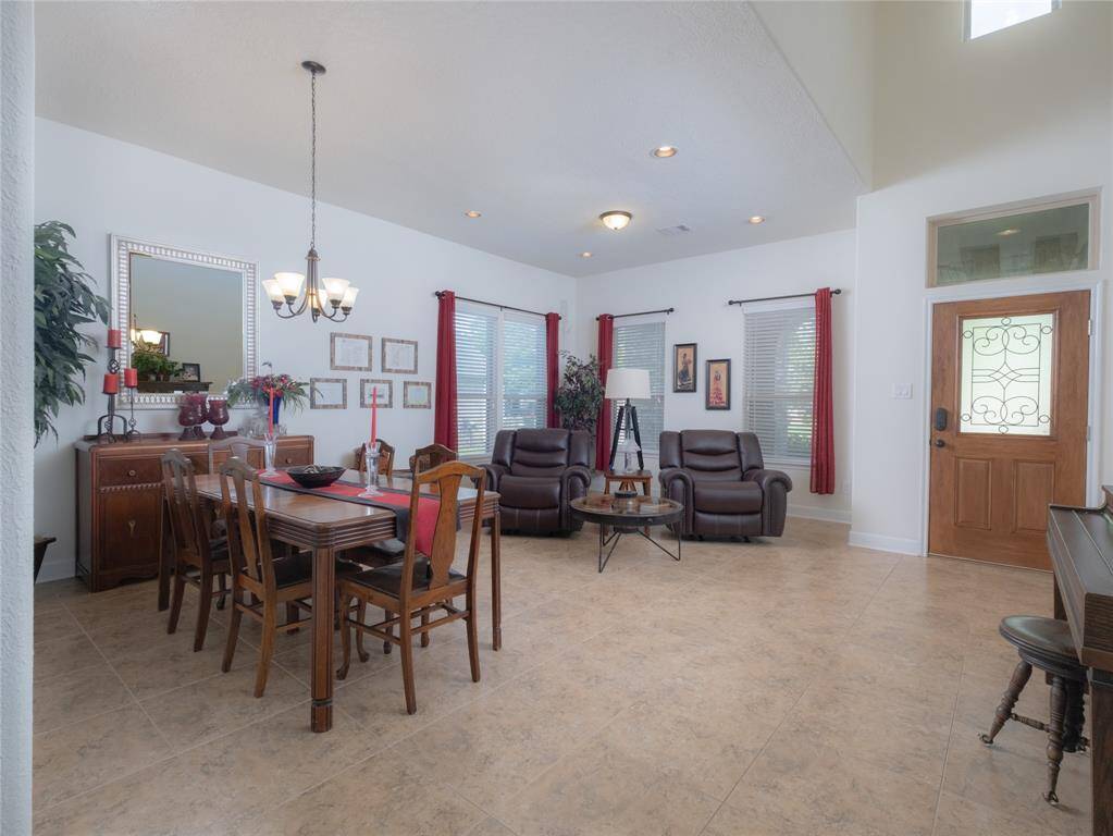 This dining and living room is bright and spacious!