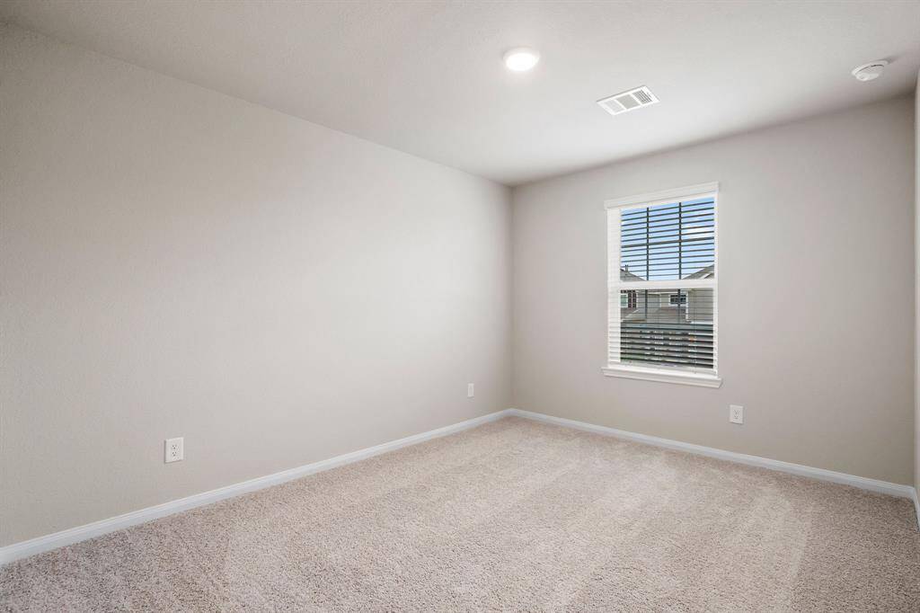 Second secondary bedroom in the front of the home