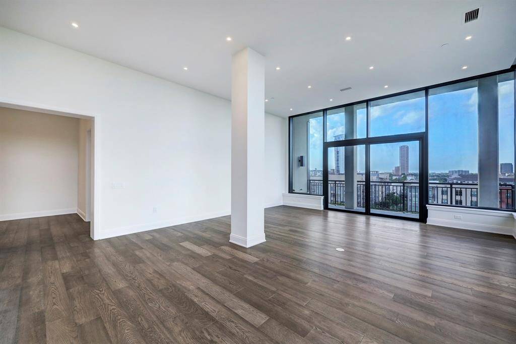 Wall of windows frame dramatic views to the north and east in this expansive 2,406-square-foot showplace perched high on the seventh floor. Wide glass doors open the great room to the large terrace for seamless indoor-outdoor enjoyment.gourmet kitchen.