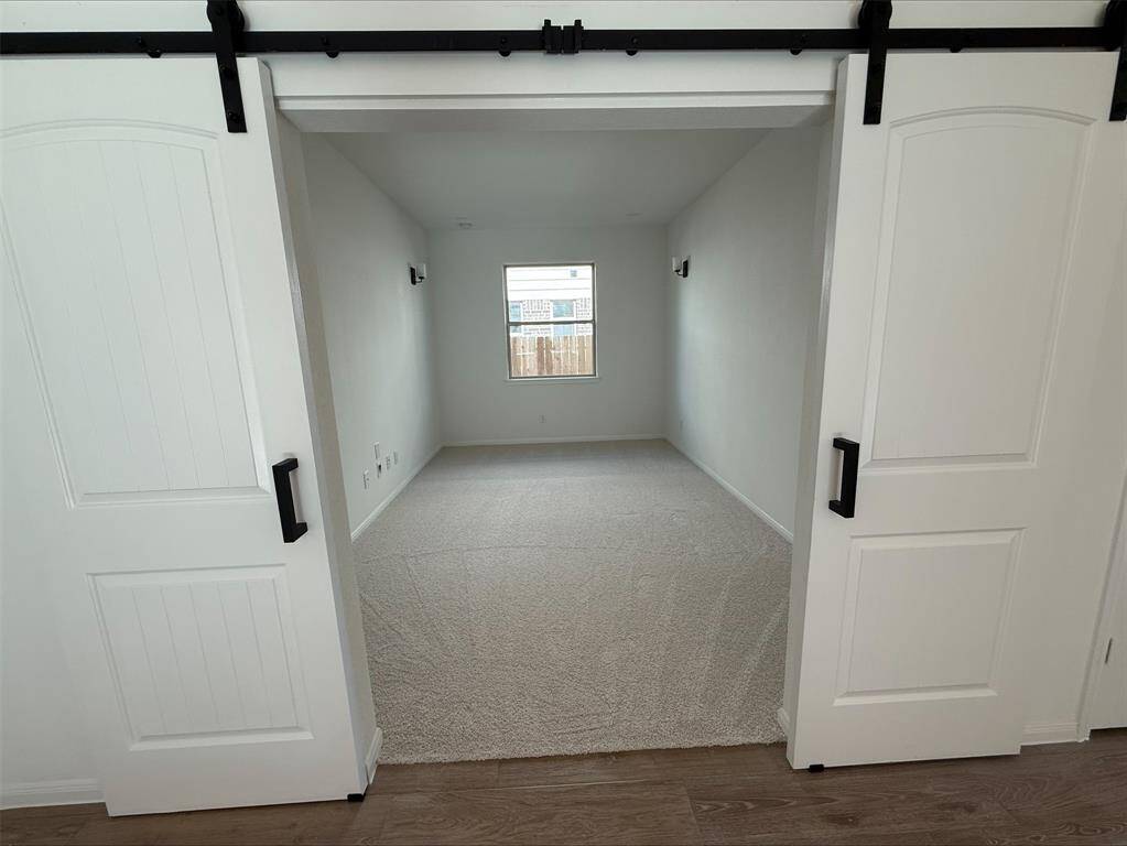Media room with barn doors