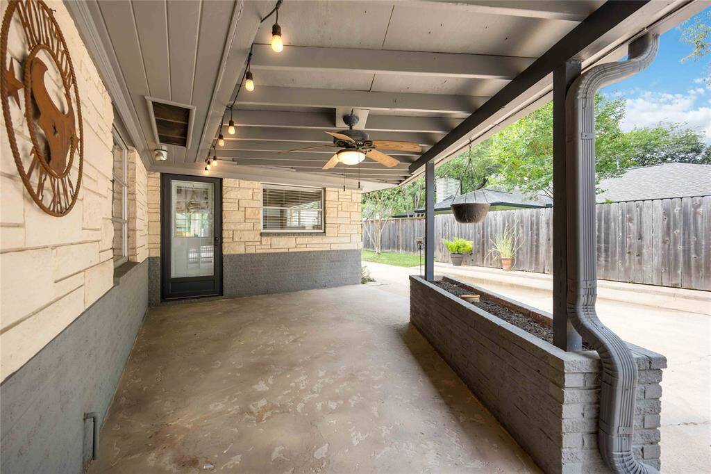 Enjoy a low maintenance backyard that features a pristine pool with waterfalls just waiting to cool you off on a hot summer day.