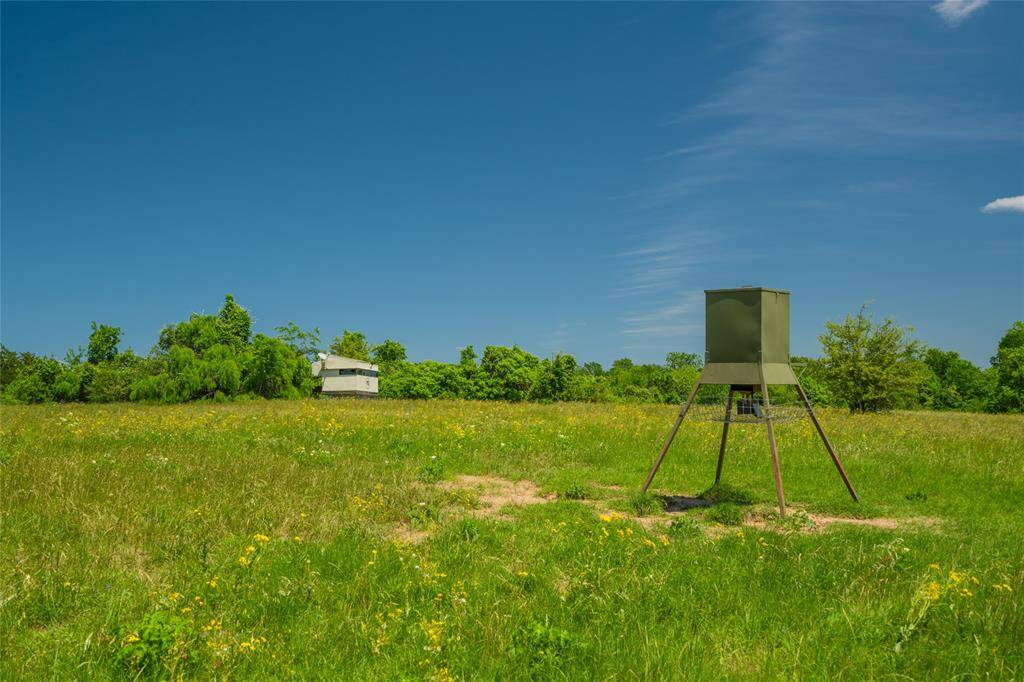 Great locations for the HUNTERS' BLINDS and DEER FEEDERS - at the edge of the forested areas and overlooking the expansive pastures!