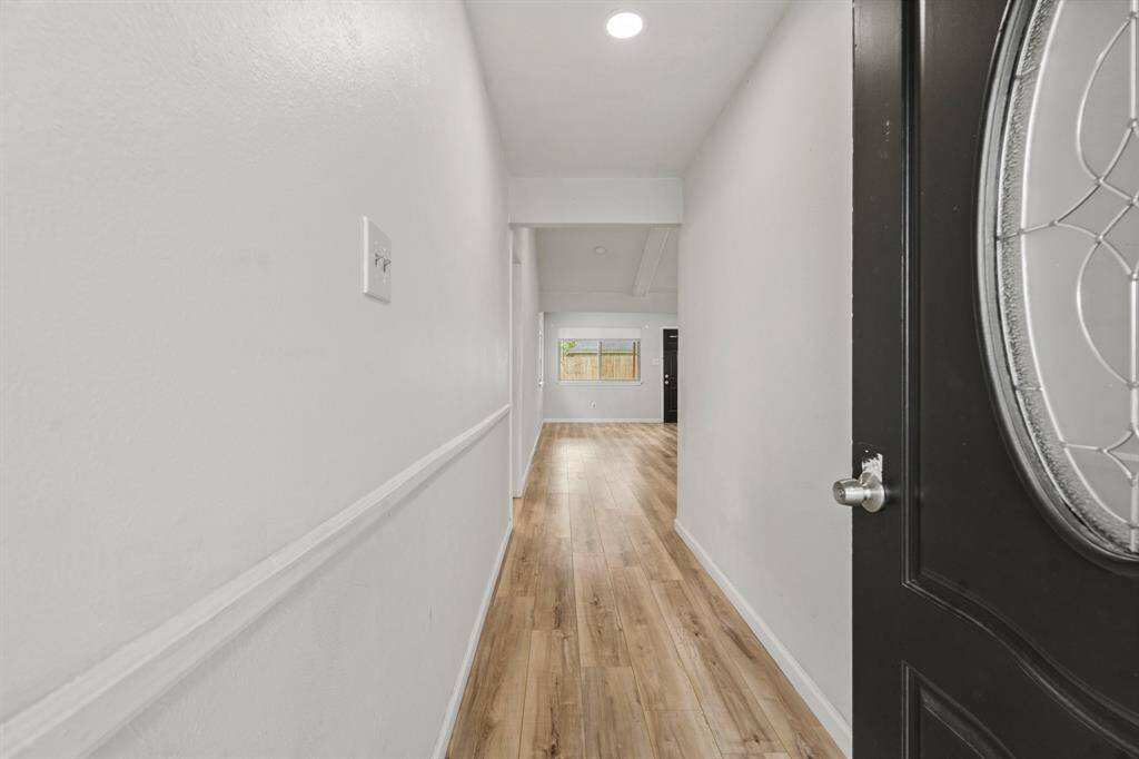 The elongated foyer welcomes you to the home.