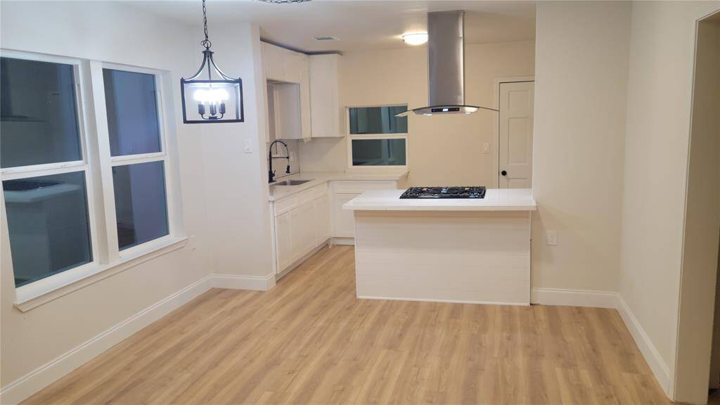 View of dining area and kitchen