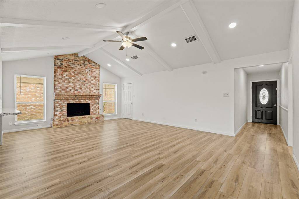 At the heart of the space, a fireplaceadds a cozy focal point, providingwarmth and charm.