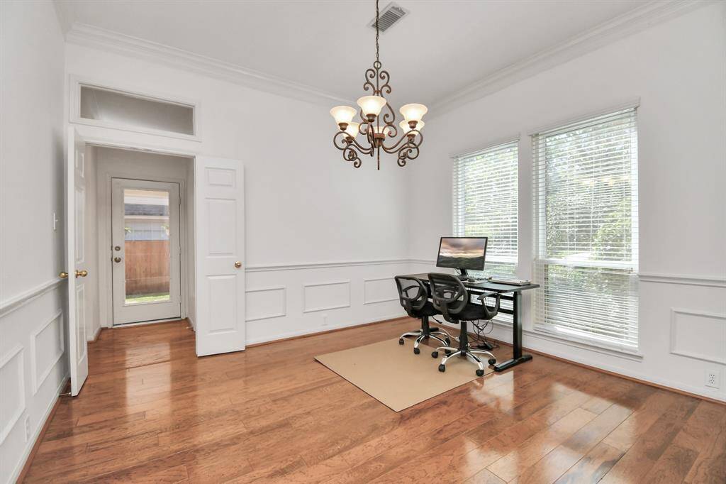 To the right of the foyer is this dining room space. Door can be closed off into the kitchen and to the covered car port!