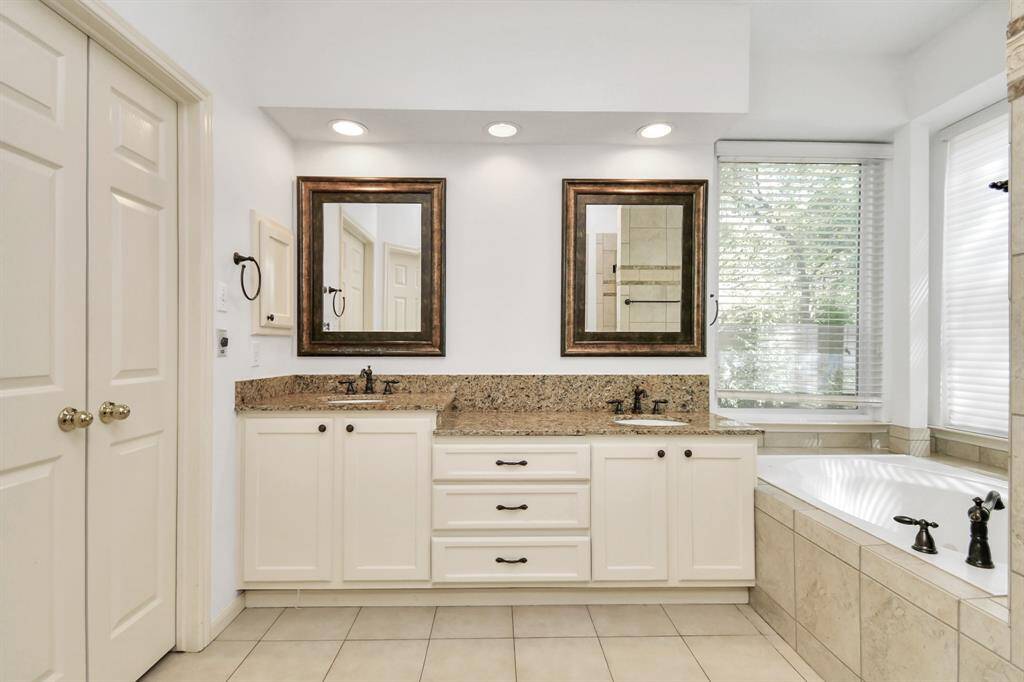 Primary bath with double sinks, granite counters and soaking tub!