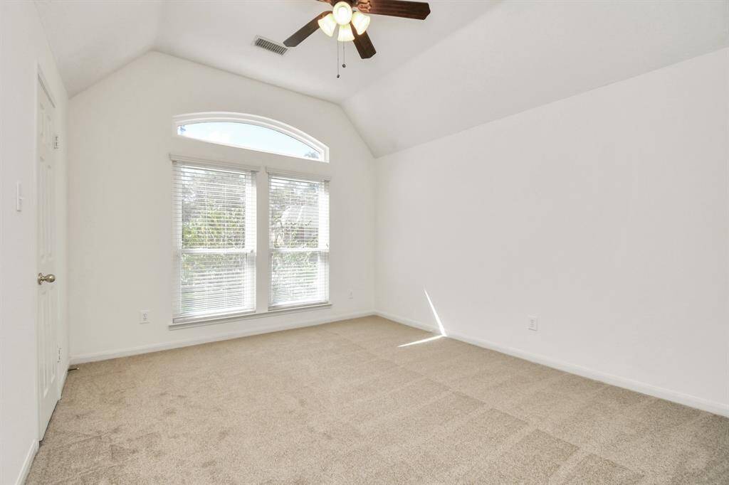 5th bedroom with beautiful windows letting in natural light!