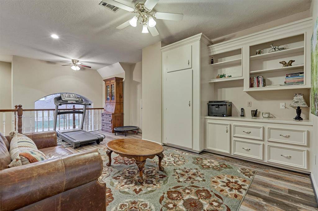 The game room offers an additional space for entertaining and has plenty of room to house books, games and puzzles.