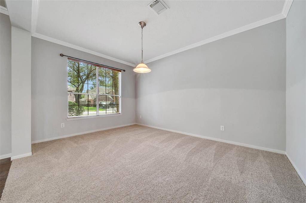 Dining room with views of the front yard.