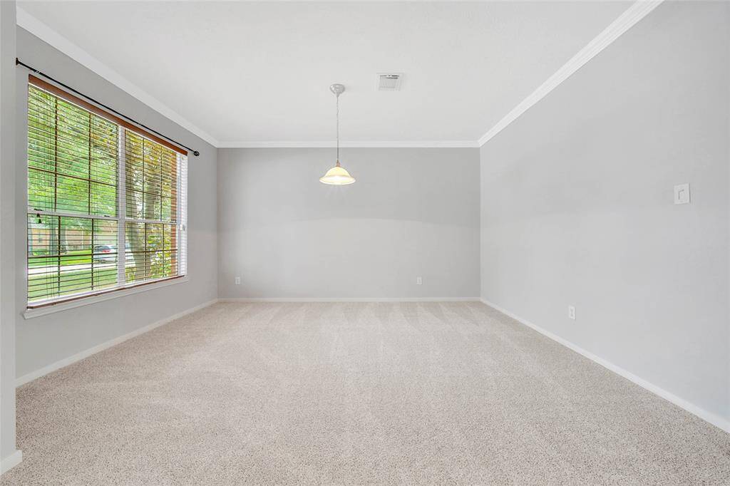 Generously-sized, light-filled dining area.