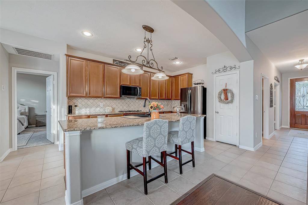 view of kitchen and breakfast bar