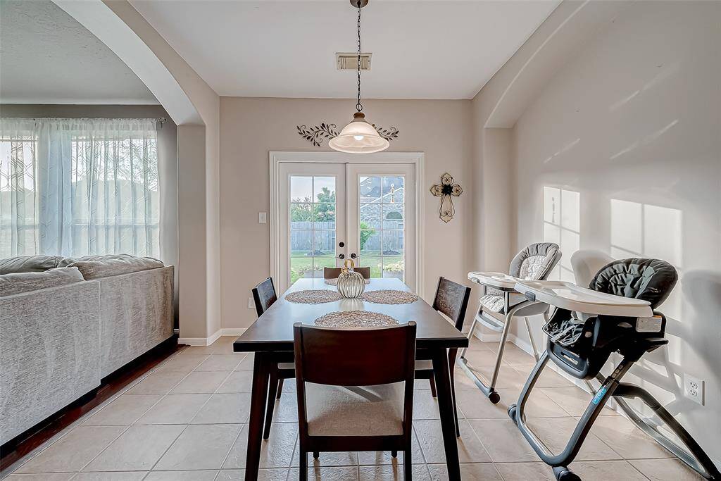 breakfast nook looking towards double doors leading outside