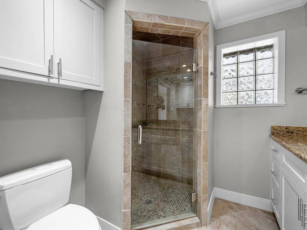 Luxurious, roomy walk-in shower.