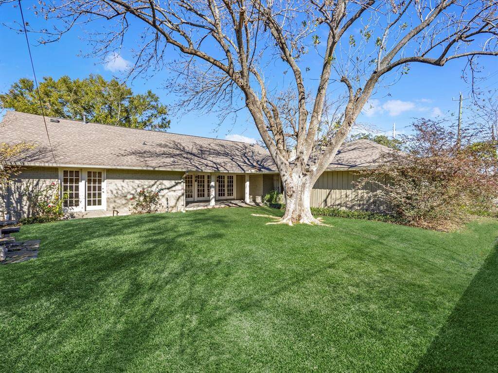 Spacious, fenced backyard perfect for family fun and pets.