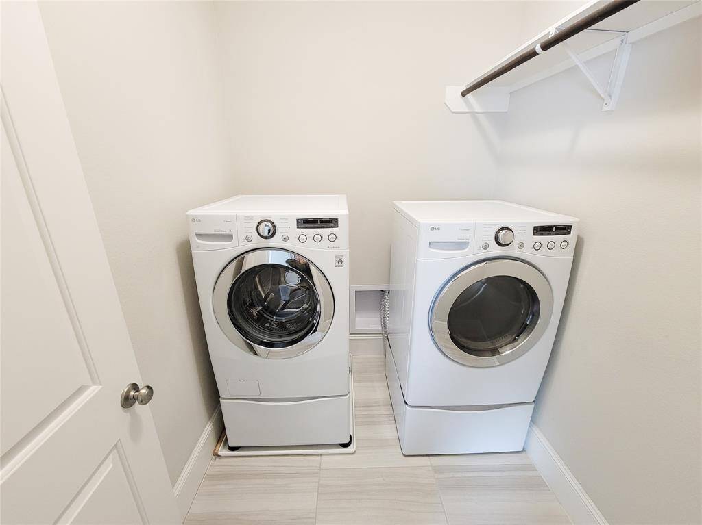 spacious laundry room on the second floor. Washer and dryer are included
