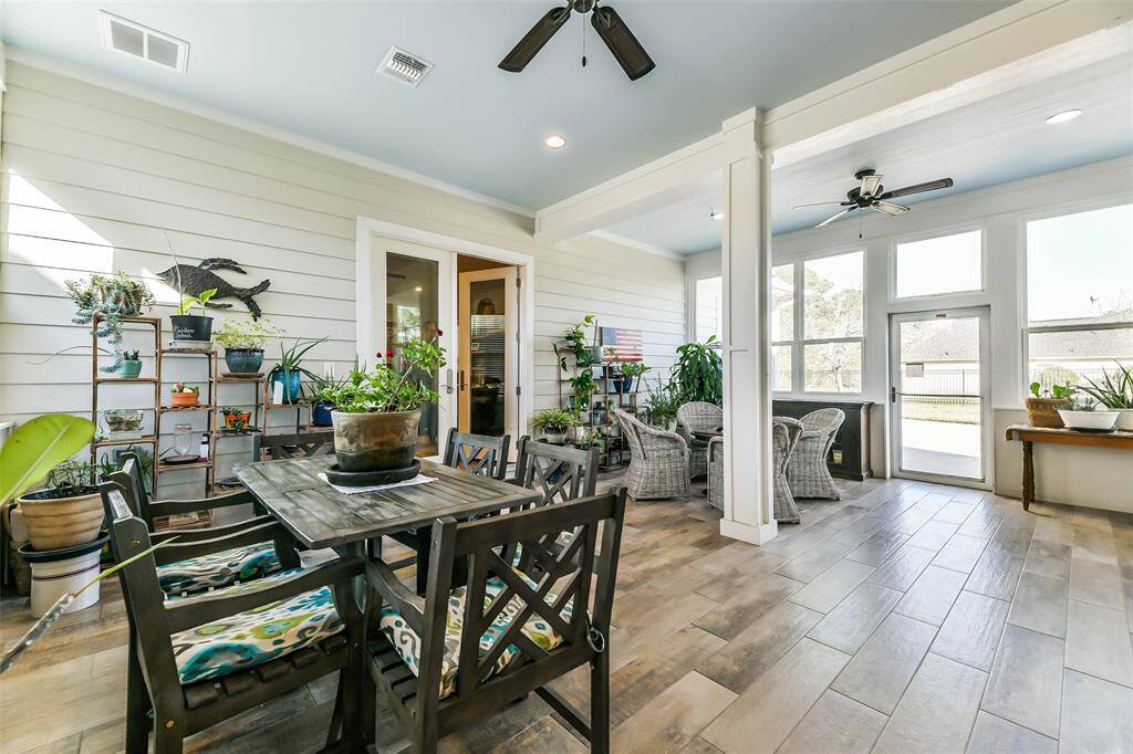 Enclosed entertaining/sunroom area that connects main & guest house