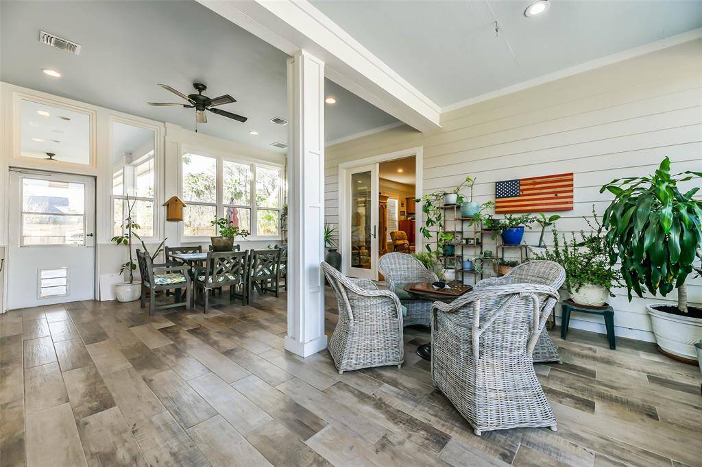 Enclosed entertaining/sunroom that connects main & guest house