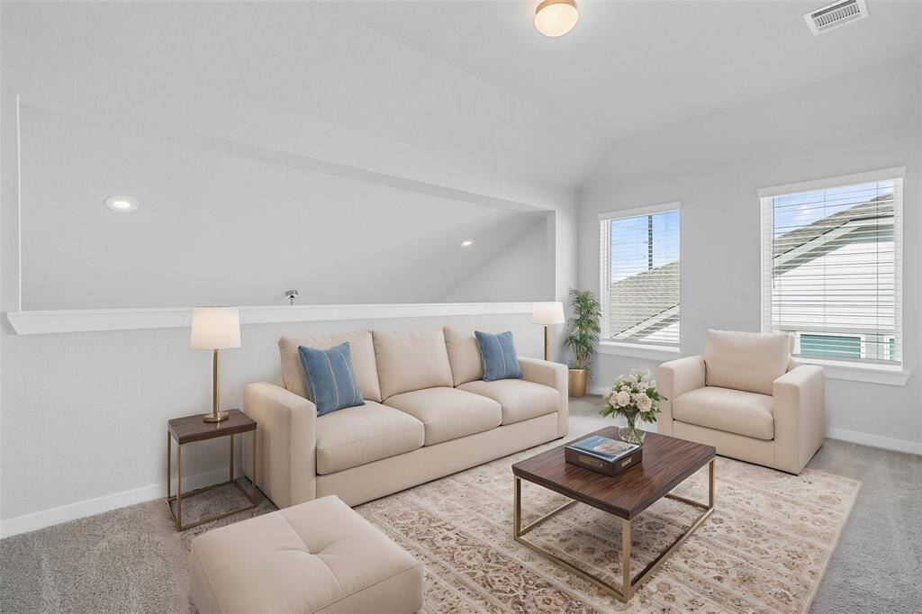 Perfect for entertaining is this amazing game room! Right upstairs this space would be a fabulous teen hangout, media room, or adult game room complete with enough room for a pool table and big screen TVs! Featuring plush carpet, high ceilings, custom paint and large windows with privacy blinds!